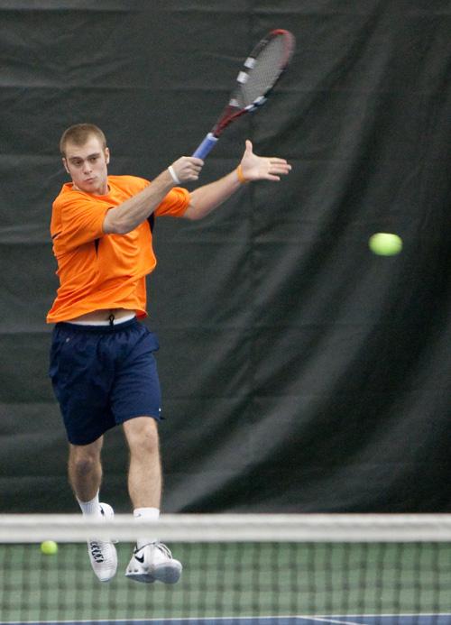 Freshman+Dennis+Nevolo+returns+the+ball+in+a+doubles+match+against+Tennessee+on+Feb.+9+at+the+Atkins+Tennis+Center.+Dean+Santarinala%0A