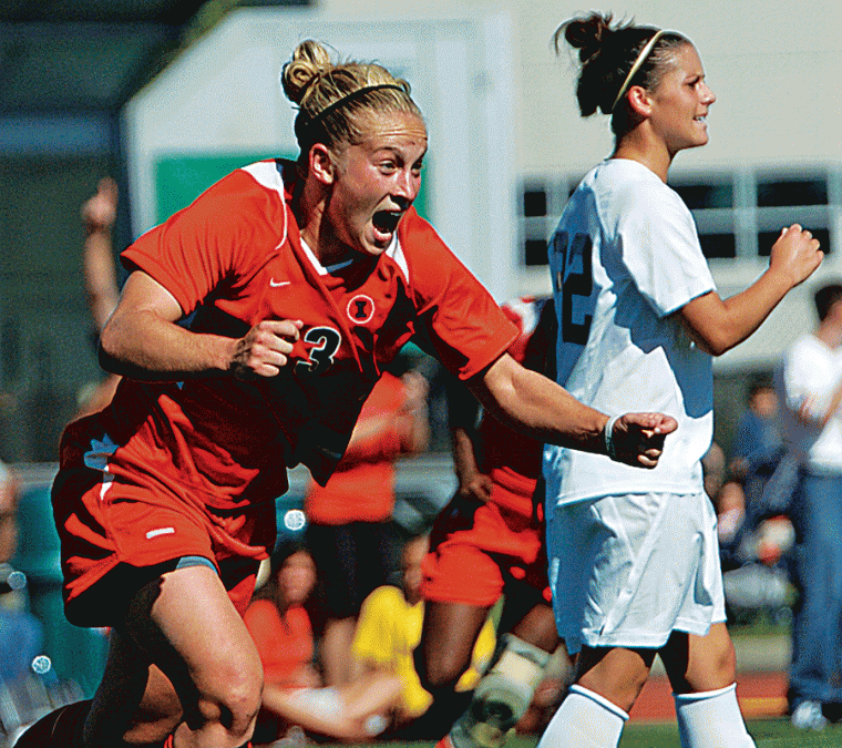 Illinois forward Ella Masar (3) celebrates after scoring her second goal to tie Illinois with Penn State in the second half, Saturday, October 1, 2006 at Illinois Track and Soccer Stadium. Illinois forward Chichi Nweke scored the final goal, sealing the 3-2 Illinois win.
