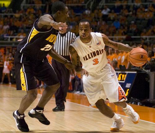 Chester Frazier dribbles to the basket in the game against Iowa on Feb. 1, 2009. Frazier recently agreed to return to Champaign as an assistant mens basketball coach.
