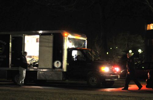 The Champaign-area bomb squad, a partnership between the University and the Champaign police, operates outside of Pennsylvania Avenue Residence Halls around midnight Friday morning. Wesley Fane
