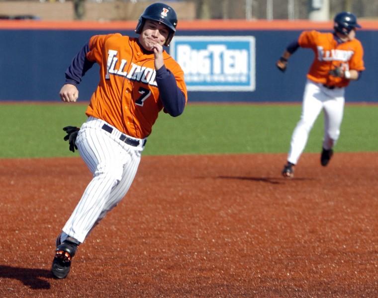 Catcher Aaron Johnson rounds the bases at the Illini baseball game against Akron at Illinois Field in Urbana, Mar. 14, 2009.
