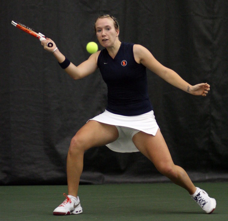 Megan Fudge, a junior, returns the ball during singles play at the Illinis Mar. 7, 2009 meeting against the Indiana Hoosiers at Atkins Tennis Center in Urbana.
