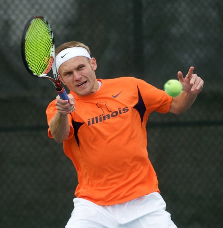 Illinois Marek Czerwinski returns a ball during doubles play against University of Kentucky at the Khan Outdoor Tennis Complex in Urbana, April 8, 2009. He and Marc Spicijaric won their match 7-4 and the Illini won 4-3.
