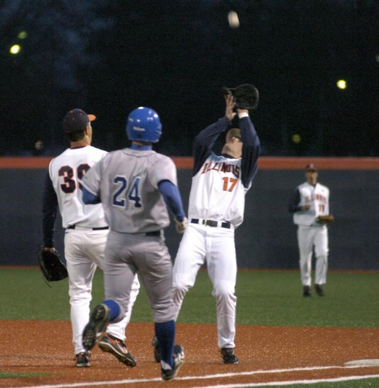 First baseman Matt Dittman (17) catches a pop-up for the second out of the seventh inning during the Illini baseball teams game against Eastern Illinois at Illinois Field on April 14, 2009.
