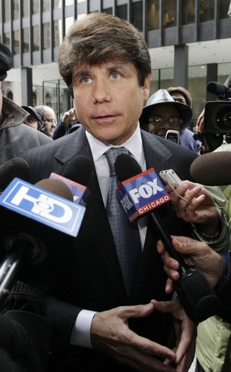 Former Illinois Gov. Rod Blagojevich arrives at federal court for his arraignment on federal racketeering and fraud charges in Chicago, Tuesday, April 14, 2009. (AP Photo/Charles Rex Arbogast)
