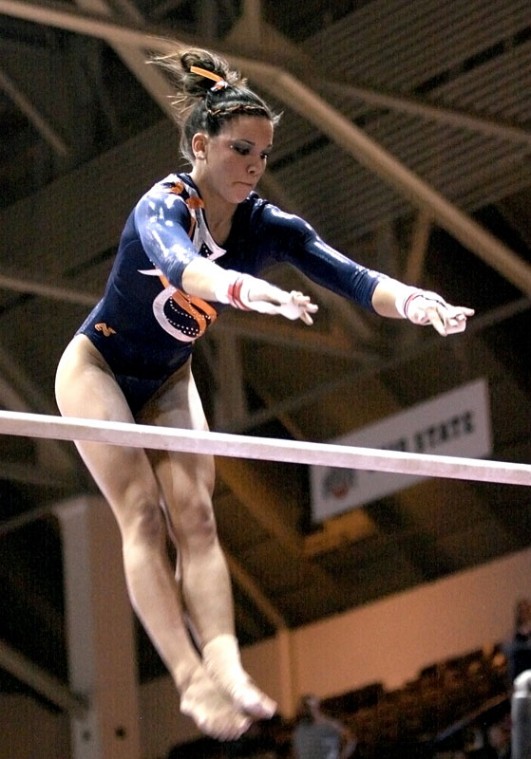 Illinois Sarah Schmidt competes on the uneven bars at the 2009 Big Ten Championships on Saturday, March 21st at Huff Hall.
