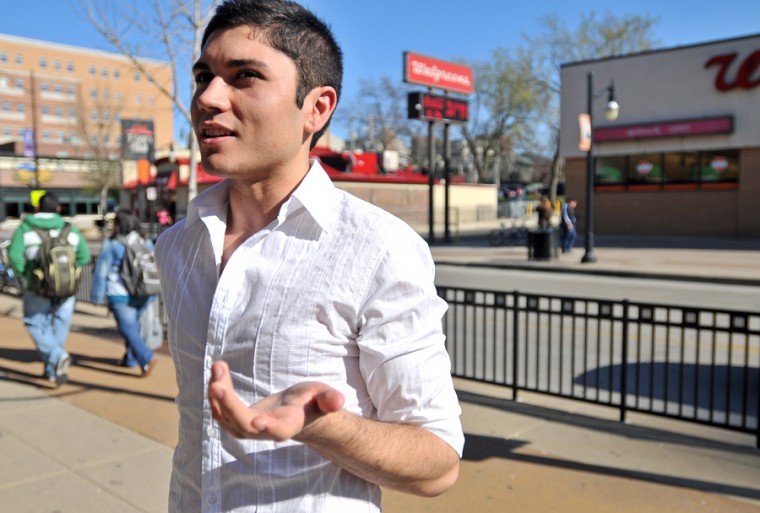 Wesley Fane The Daily Illini Steven Velasquez, junior in AHS, stands at the location where he was attacked last year on Green Street in Champaign, on Thursday, April 16, 2009. Velasquez believes that the attack, which happened as he was coming home from a bar in 2008, was because of his sexual orientation.
