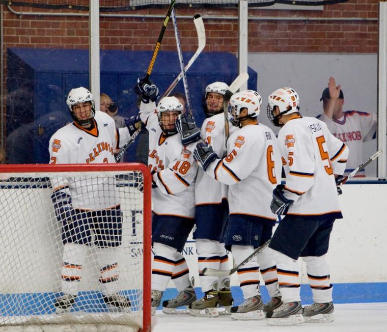 Illinois+teammates+celebrate+a+goal+against+Michigan-Dearborn+at+the+Ice+Arena+on+Friday%2C+November+14%2C+2008.%0A