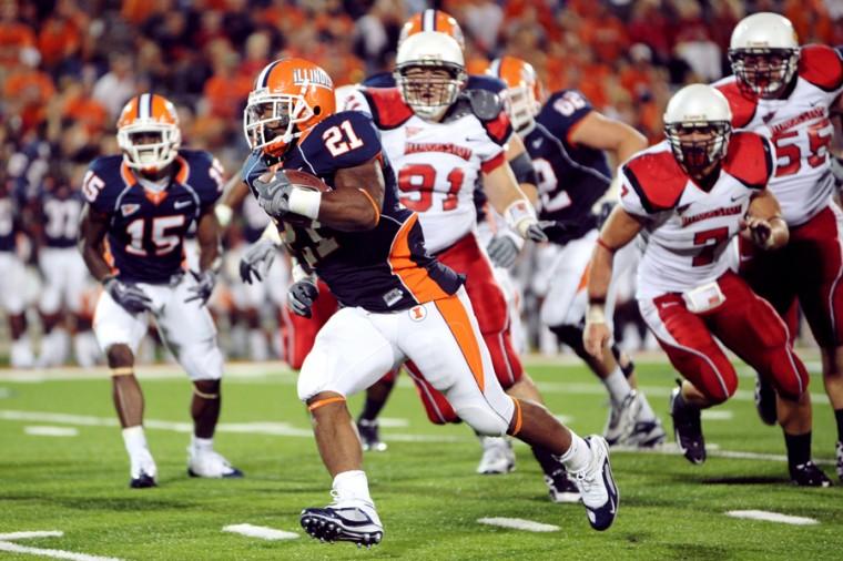 Illinois+Jason+Ford+%2821%29+rushes+the+ball+during+the+game+against+Illinois+State+at+Memorial+Stadium+Saturday%2C+Sept.+12%2C+2009.+The+Illini+defeated+the+Redbirds+45-17+to+improve+1-1+on+the+season.%0A