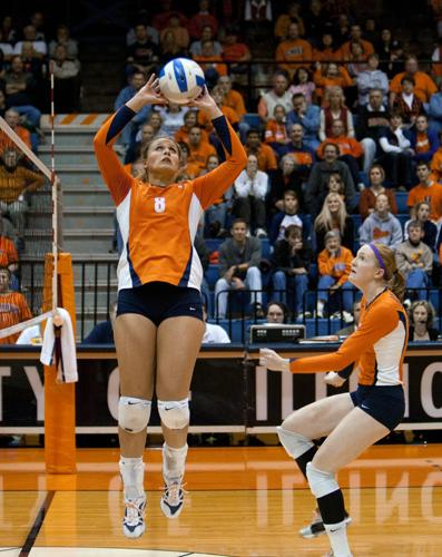 Illinois Hillary Haen (8) sets the ball to Erin Johnson (12) against Purdue at Huff Hall on Friday, October 9, 2009.
