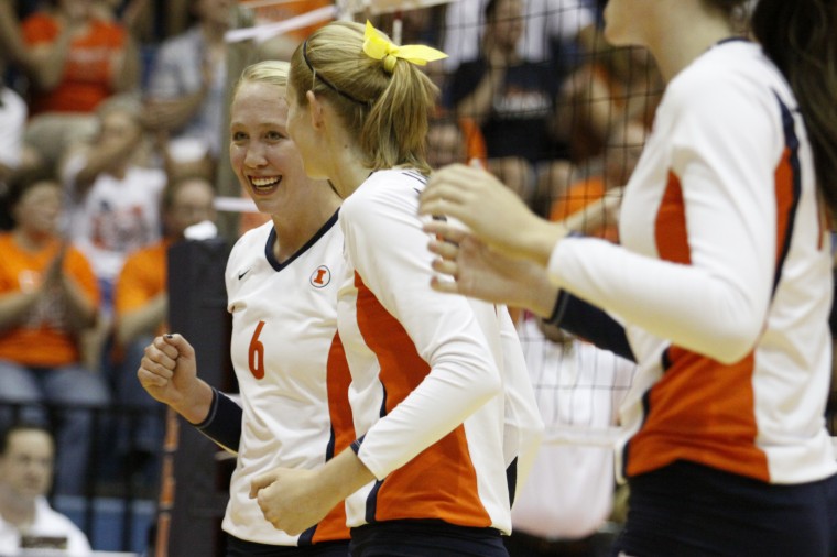 Illinois Michelle Bartsch (6) smiles after a point won during the match against Tennessee at Huff Hall. The Sept. 2nd match was for the State Farm Illini Classic held that weekend.
