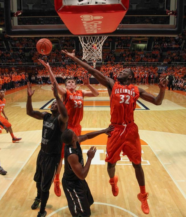 Illinois Jon Ekey (33) goes up for a put-back dunk during the game against Chicago State at State Farm Center, on Friday, Nov. 23, 2013. The Illini won 77-53.