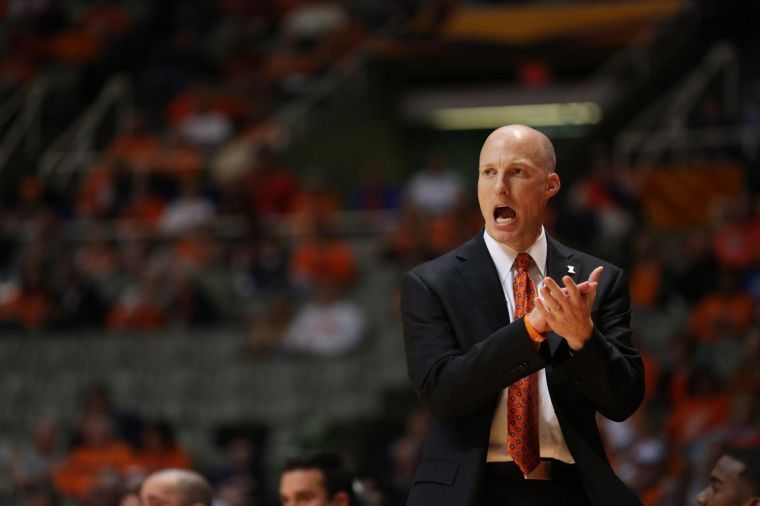 Illinois head coach John Groce instructs his team during the exibition game against Northwood at State Farm Center on Sunday. Groce returns just three scholarship players in his second season.
