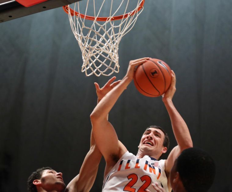 Illinois Maverick Morgan (22) pulls down an offensive rebound during the game against Bradley at State Farm Center on Sunday, Nov. 18, 2013. The Illini won 81-55.