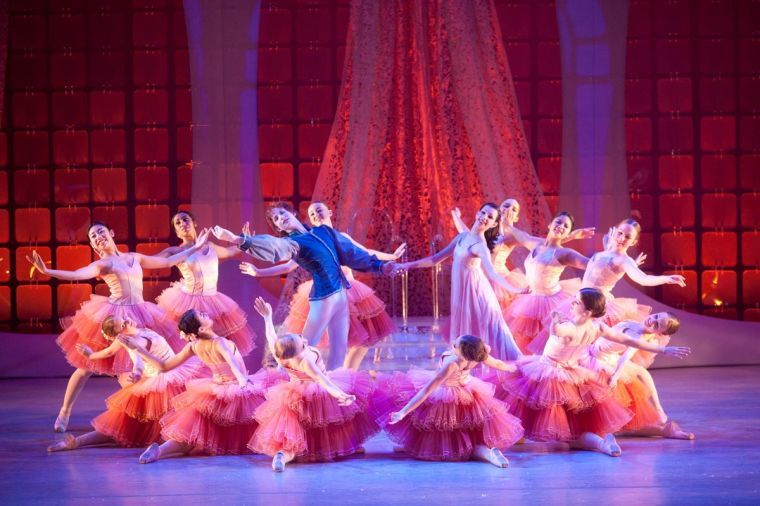 The Champaign Urbana Ballet performs a waltz with Clara and her prince during a “The Nutcracker” performance in 2012. 