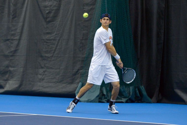 Illinois’ Jared Hiltzik hits the ball during the match against No. 8 Texas at Atkins Tennis Center on Sunday, Feb. 9, 2014. The Illini won 4-3.