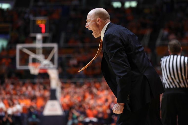 Illinois’ head coach John Groce reacts to the play during the game against Iowa at State Farm Center on Saturday. The Illini lost 81-74.