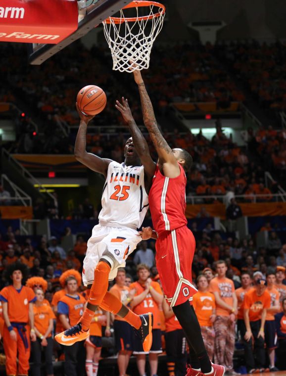 Illinois Kendrick Nunn (25) attempts a contested layup during the game against No. 22 Ohio State at State Farm Center on Saturday, Feb. 15, 2014. The Illini lost 48-39.