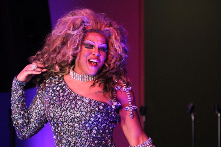 Kelasia Karmikal, a drag queen also known as Kenneth Johnson, performs her second piece at the Illini Union Board Drag Show, held Thursday, March 13, 2014. Karmikal organized the show with the board.