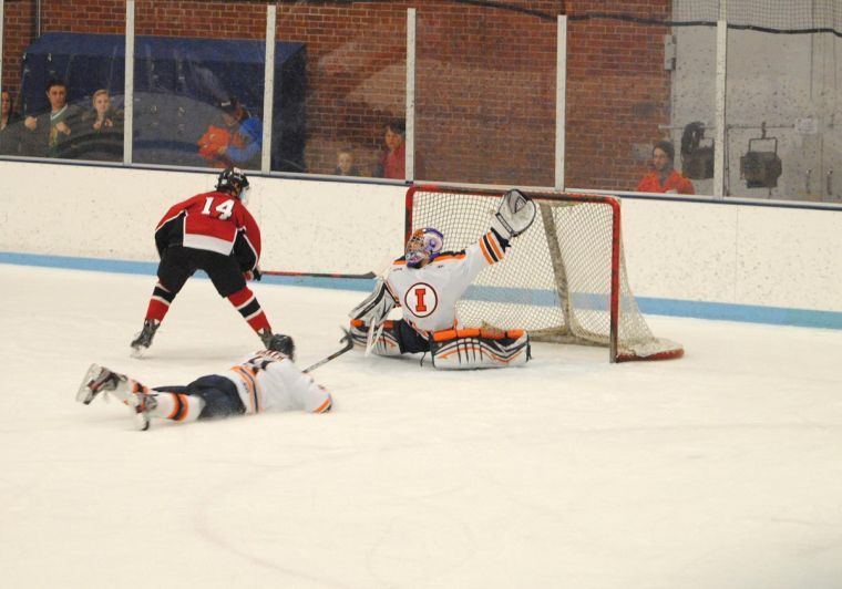 Nick Clarke makes a save in a 4-3 shootout loss against Minot State on Feb. 1. Clarke played his final game at the Big Pond on Sunday.