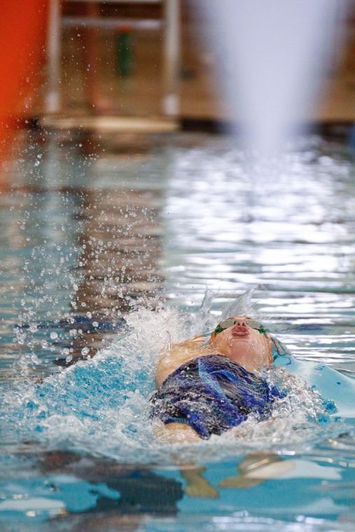 Illinois’ Alison Meng swims the backstroke leg of the 200 yard medley event during the annual Orange and Blue exhibition meet at the ARC on Oct. 13. The Blue team won 120.5 to 100.5, and the Illini took second place overall.