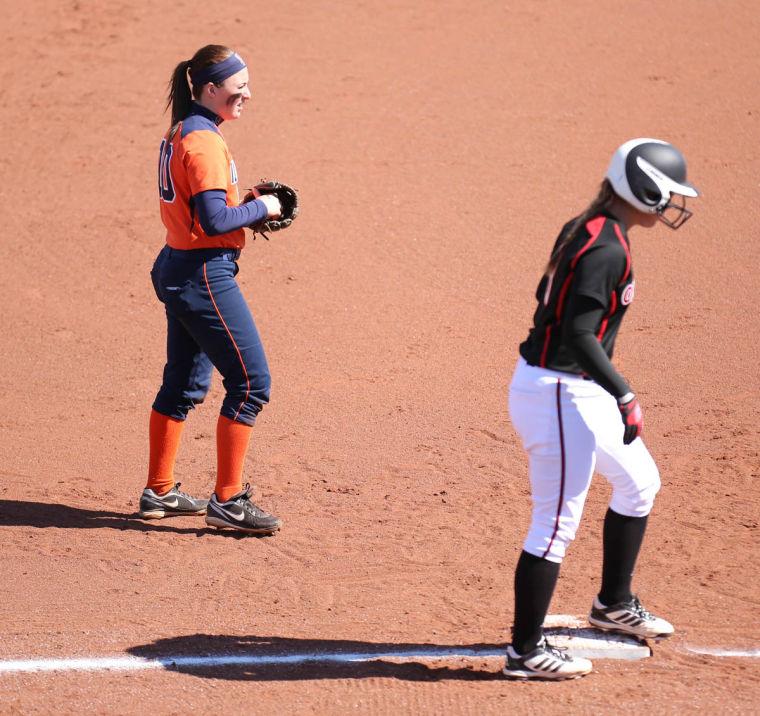 Illinois Katie Repole (10) watches over third base during the match against Omaha at Eichelberger Field, on Saturday, Mar. 15, 2014. The Illni won 6-1.