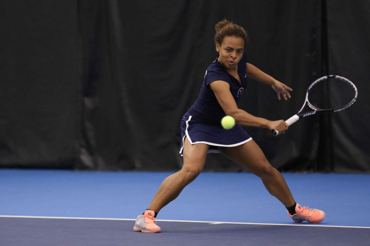 Illinois Jerricka Boone attempts to return the ball during the meet against Nebraska, at Atkins Tennis Center, on April 13, 2014. The Illini won 4-2.