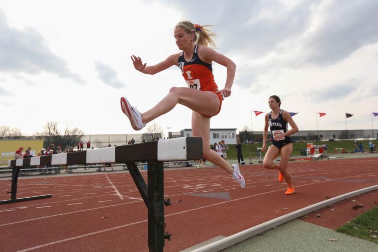 Illinois Britten Petrey runs the 3000-meter Steeplechase during the Illinois Twilight Track and Field meet at Illinois Soccer and Track Stadium on Saturday, April 12.