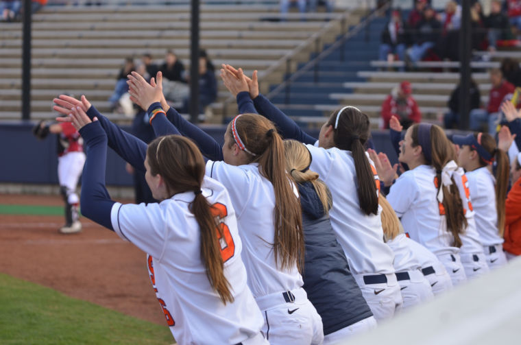 Fighting Illini Softball players cheer for their teammates during the second game of a double header against Indiana on Saturday at Eichelberger Field. The Illini won 1-0.