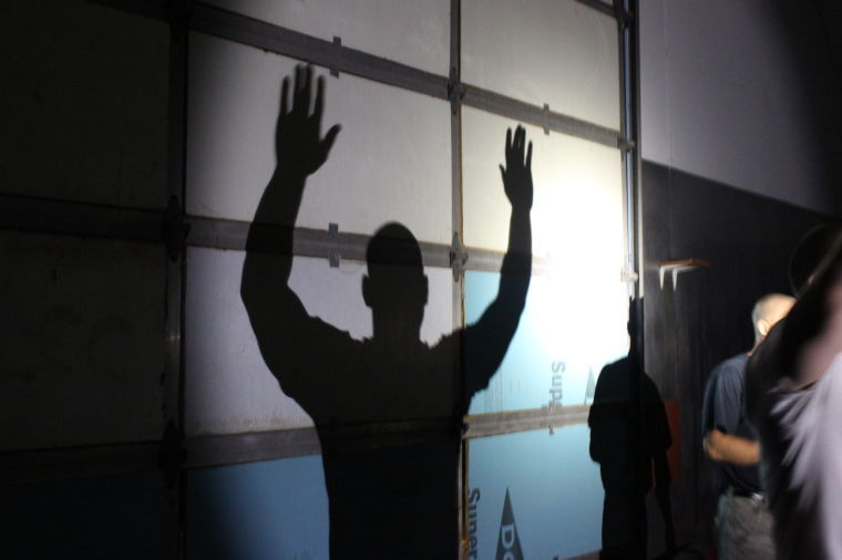 Cody Hammond, a deputy sheriff from Coles County, pretends to be a criminal during a control tactics lesson at the Willard Training Center. Recruits took turns acting as both police and criminals to practice all of the tactics they learned during their training.