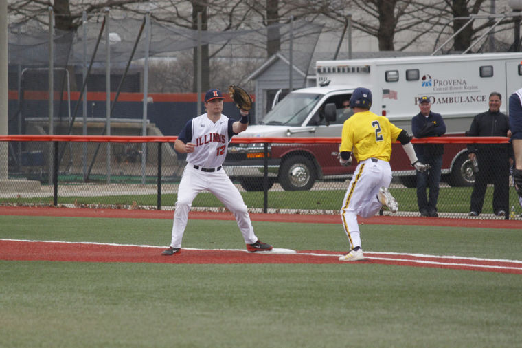 Illinois David Kerian (12) prepares to catch a ball during the game against Michigan at Illinois Field on Sunday. The Illini lost 4-2.