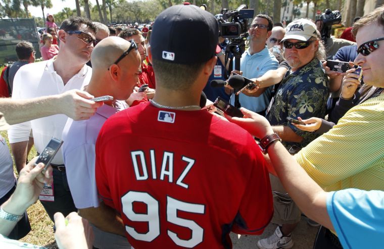 Newly signed St. Louis Cardinals Aledmys Diaz talks to the media during practice, Monday, March 10, 2014, at Roger Dean Stadium in Jupiter, Fla.