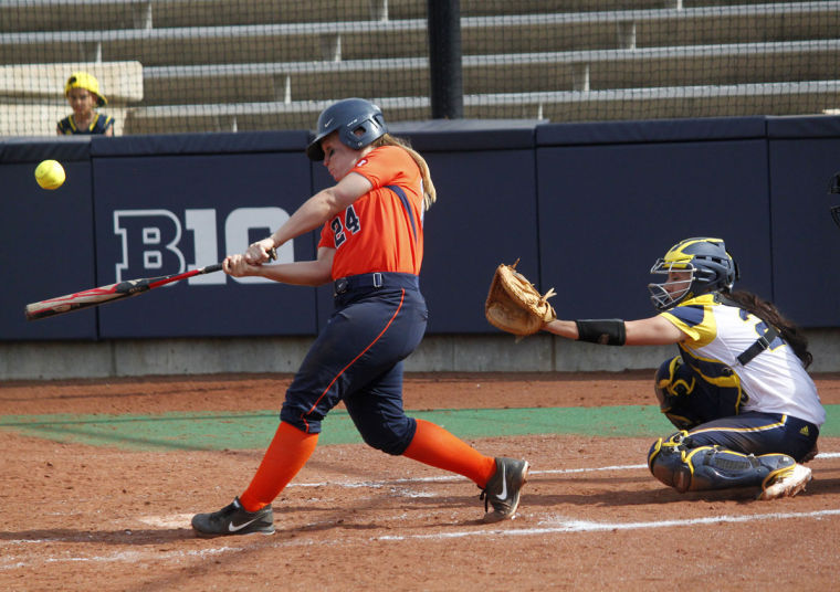 Illinois Jenna Mychko (24) hits the ball during the second game against Michigan on Saturday April 26. The Illini lost 6-5.