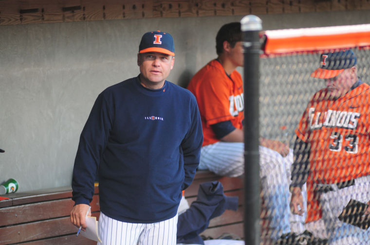 Illinois Coach Dan Hartleb listens to a player during the game versus Bradley on April 27, 2010.
