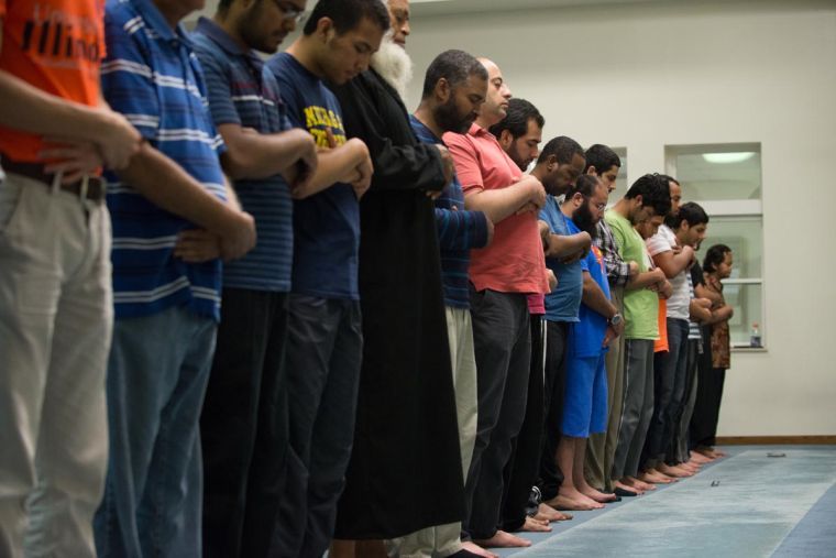 Men pray at the Central Illinois Mosque & Islamic Center in preparation for Ramadan, which began on the 28th of June.