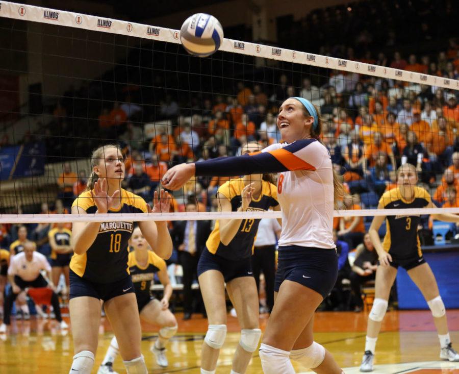 Illinois Alexis Villunas (8) bumps the ball during an NCAA Tournament second-round match against Marquette at Huff Hall on Saturday, Dec. 7, 2013. The Illini won 3-1.