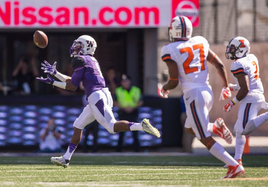 Washingtons John Ross III hauls in a 75-yard touchdown in the first quarter against Illinois at Husky Stadium in Seattle on Saturday. Washington handed Illinois its first loss in a 44-19 Huskies win.