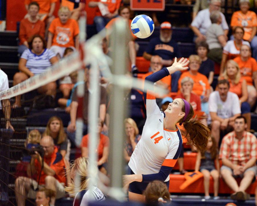 Illinois' outside hitter Liz McMahon  hits the ball during the Alumni Match on Aug. 23. 