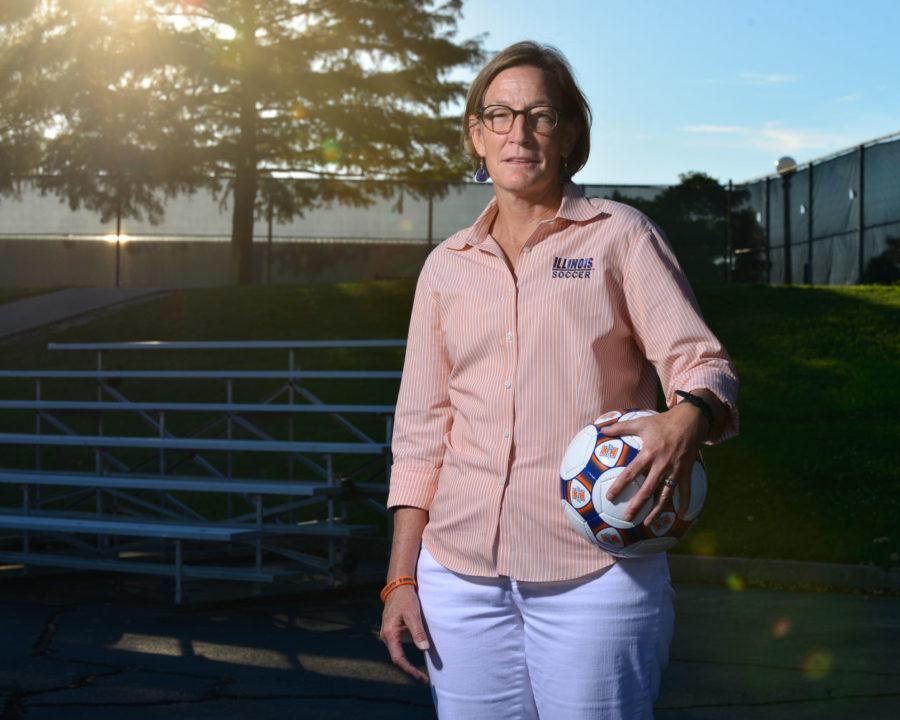 Soccer coach wins 200th career game in beginning of 13th season at Illinois.