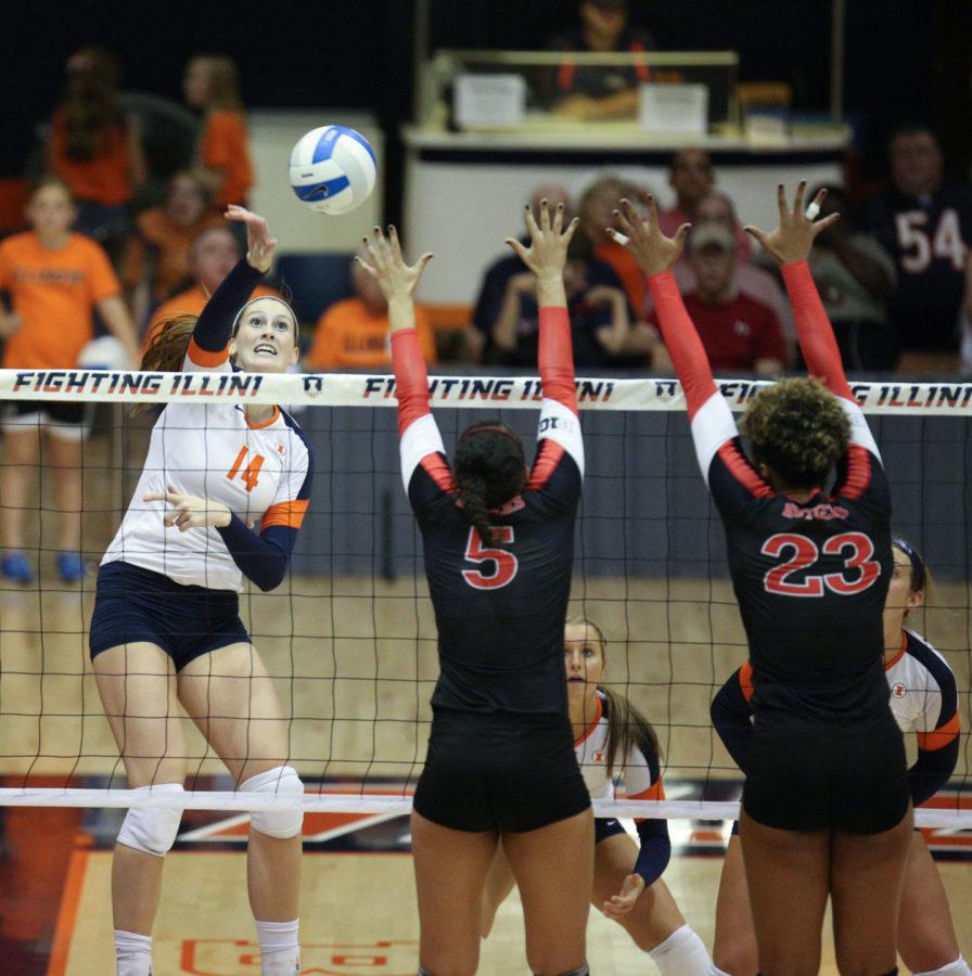 Illinois Liz McMahon (14) spikes the ball during the game against Rutgers at George Huff Hall, on Saturday, Sept. 27th. The Illini won 3-0.