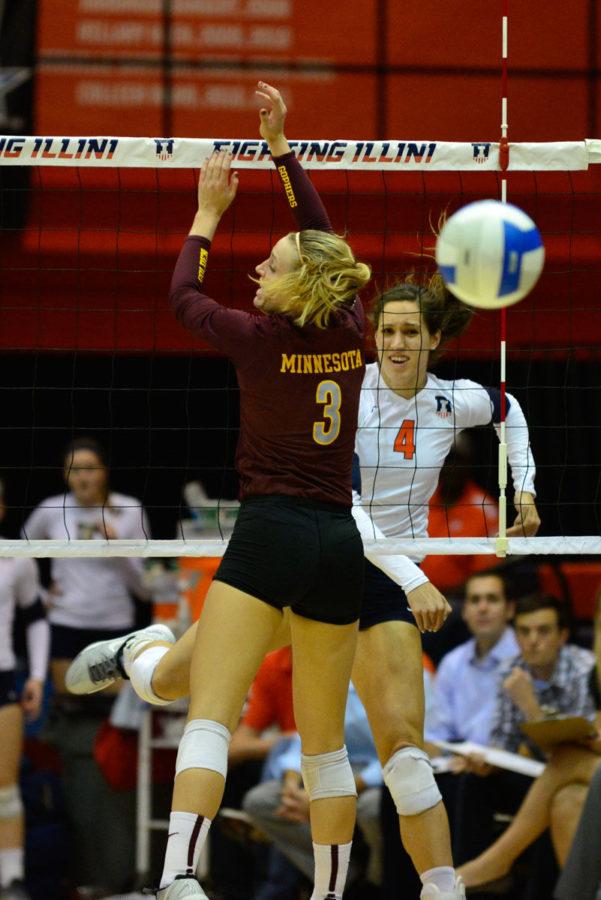 Illinois Michelle Strizak watches on after spiking the ball during the game against Minnesota at Huff Hall, on Wednesday, Oct. 1, 2014. The Illini won 3-0.
