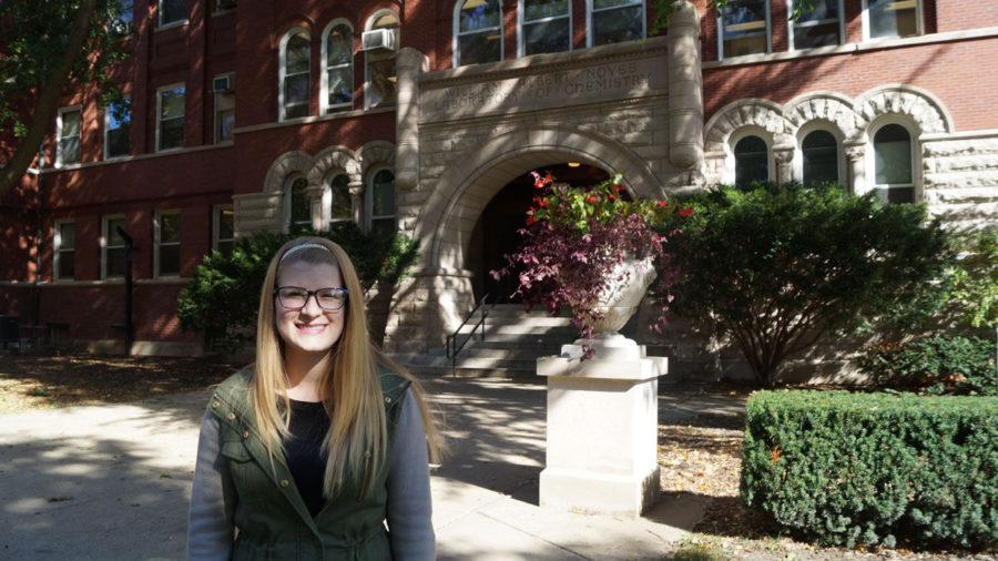 REACT Program staff member, Emilee Nawa, stands in front of the Noyes Laboratory on Tuesday, Oct. 21, 2014.