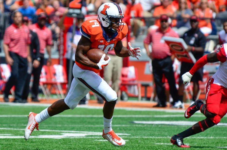 Illinois+Justin+Hardee+%2819%29+runs+for+a+touchdown+during+the+game+against+Western+Kentucky+at+Memorial+Stadium+on+Sept.+6.