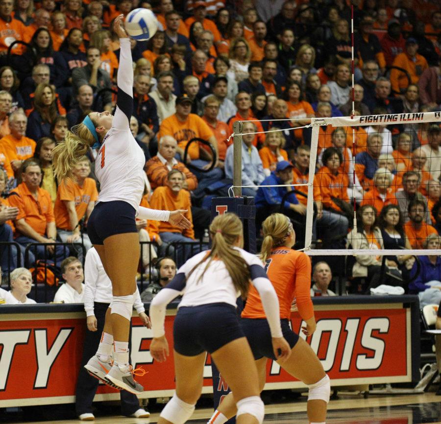 Illinois Jocelynn Birks (7) spikes the ball during the game against Rutgers at George Huff Hall, on Saturday, Sept. 27th. The Illini won 3-0.