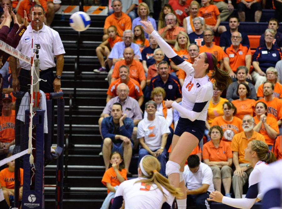 Illinois’ Liz McMahon spikes the ball against Minnesota at Huff Hall on Oct. 1. McMahon and her fellow seniors will play in their final home game at Huff on Saturday. 