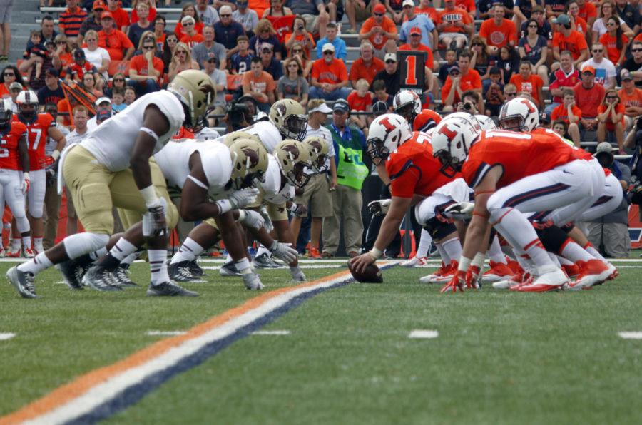 Illinois offensive line prepares for a play during the game against Texas State on Sept. 20, 2014. Illinois won 42-35.