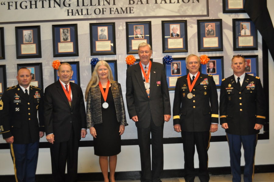 Four+University+ROTC+alumni+being+awarded+their+medals+at+the+2014+Hall+of+Fame+ceremony.