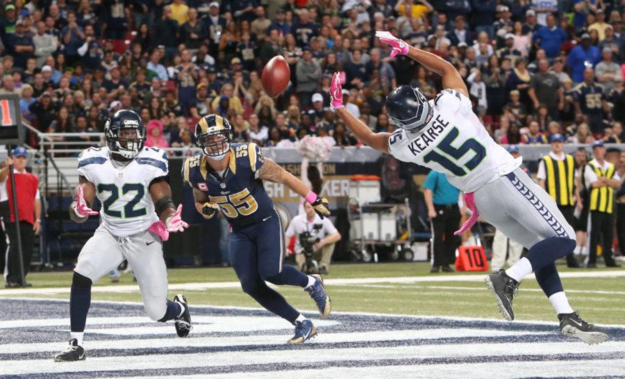 Seattle Seahawks running back Robert Turbin (left) and Jermaine Kearse are unable to catch a pass as St. Louis Rams linebacker James Laurinaitis defends on a two-point conversion attempt on Sunday.