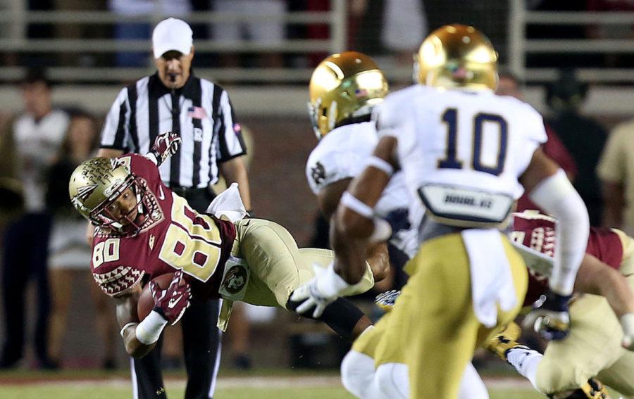 Florida State receiver Rashad Greene (80) makes a catch early in the first quarter against Notre Dame on Saturday, Oct. 18. Prado slots Florida State in the first-seed and Notre Dame in the sixth-seed.