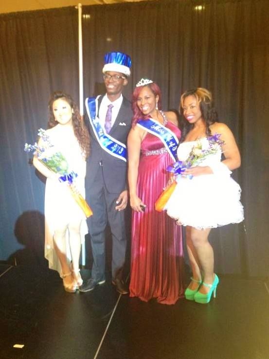 Past Mr. and Ms. U of I winners pose after being crowned.
